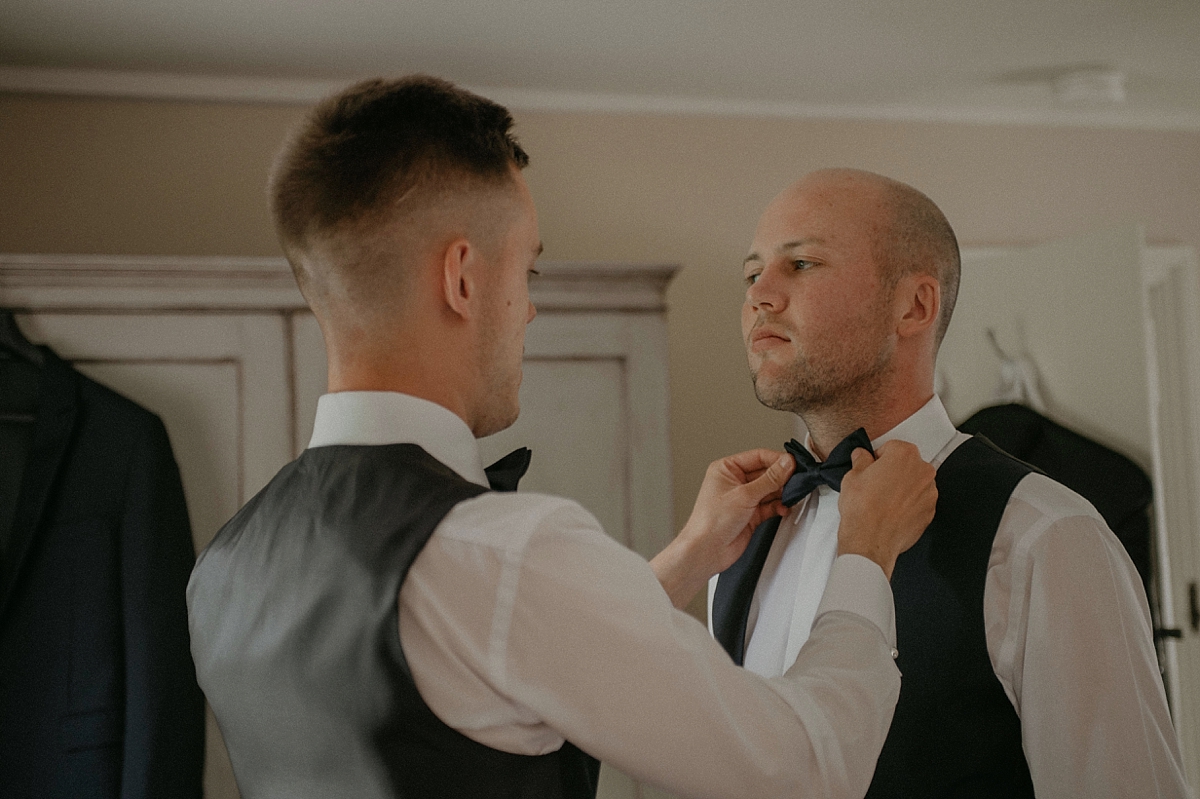 groom bow tie getting ready braxted park