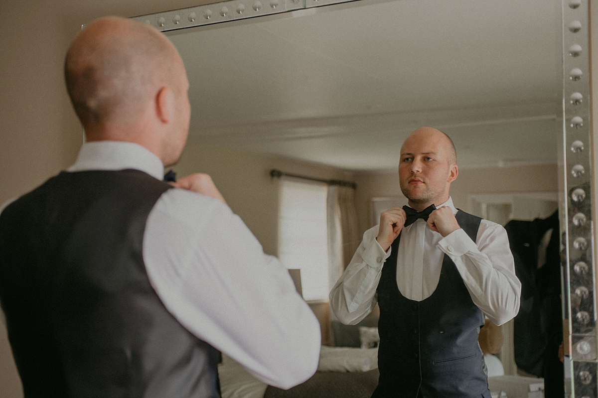 groom bow tie getting ready braxted park essex wedding