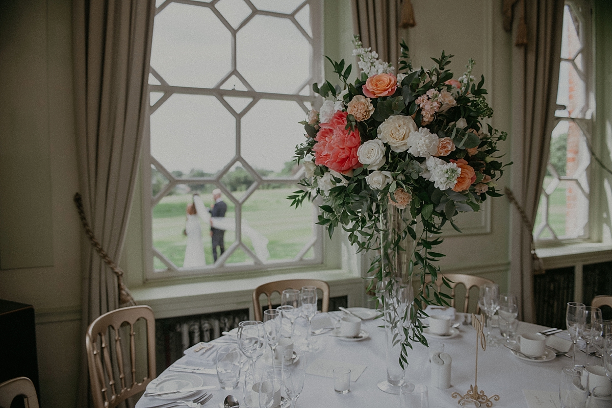 braxted park wedding essex room set up flower arrangement flowermill bride groom window