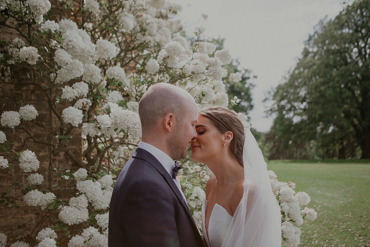 braxted park bride groom couple poses flowers portrait essex wedding photography