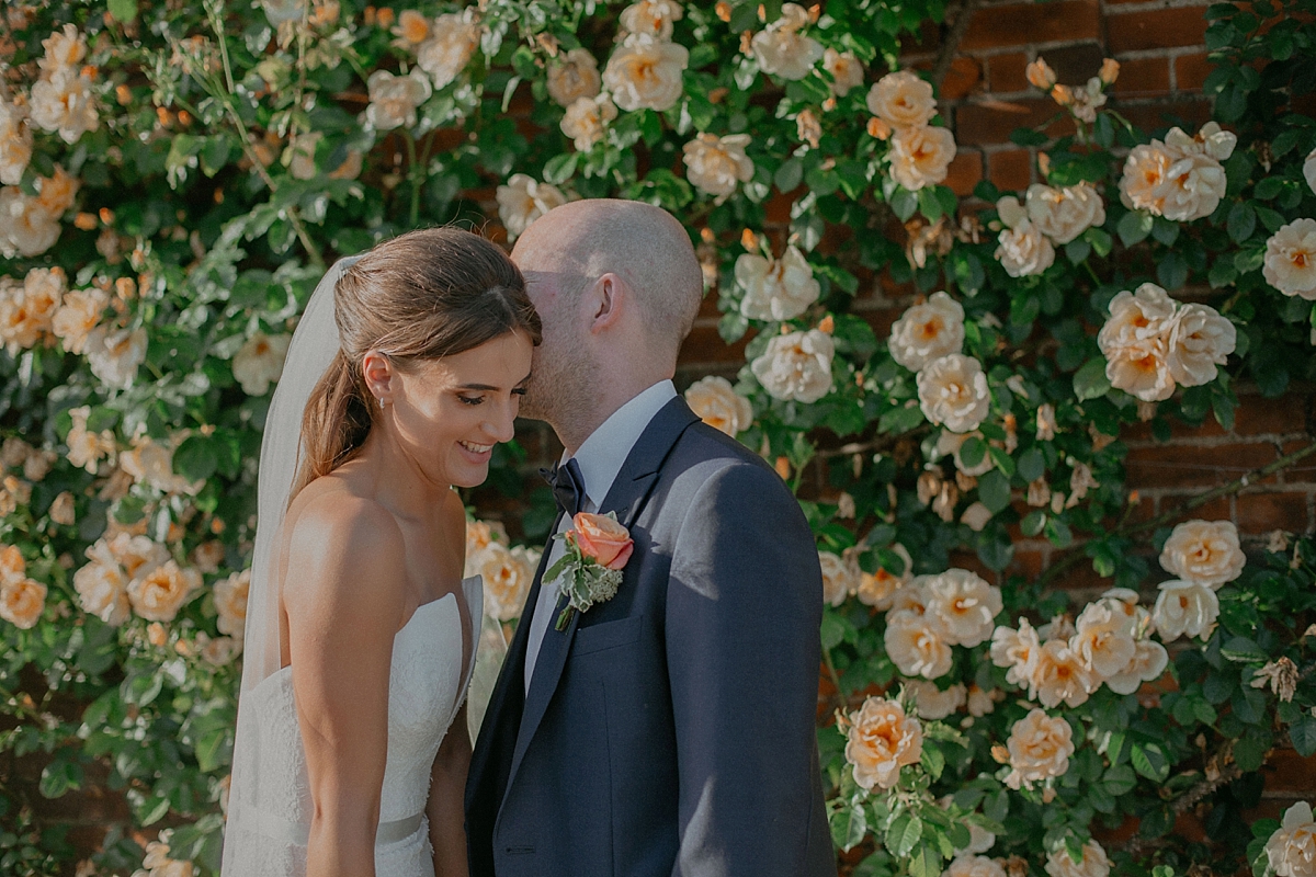 sunflare golden hour braxted park essex bride groom couple portrait photography peach rose