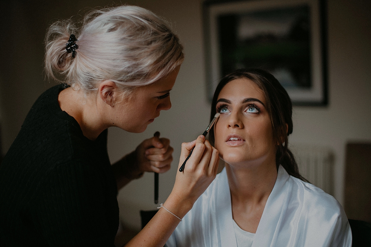 makeup getting ready bride braxted park wedding essex