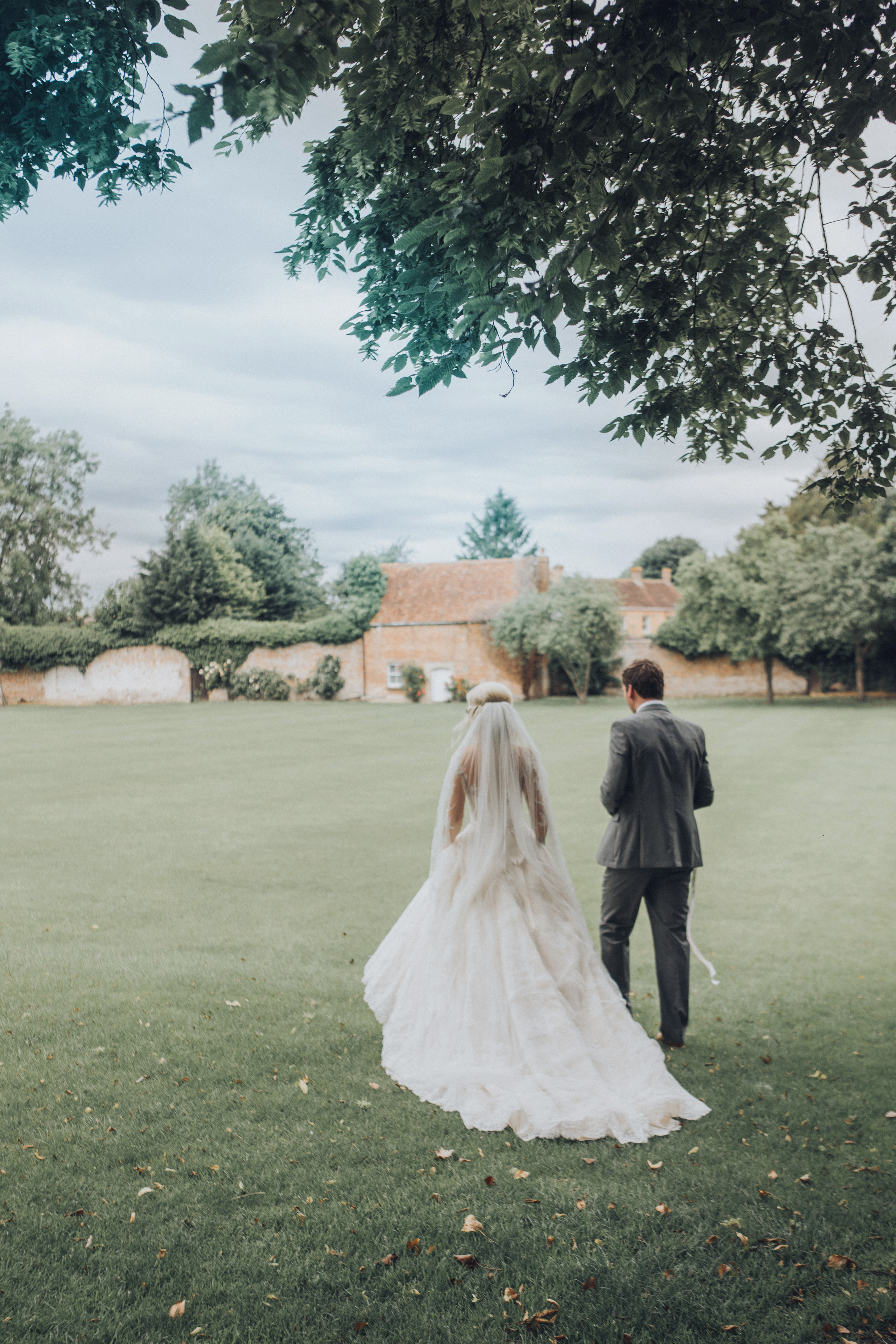 Fine art luxury wedding photography dornton house hall back of dress 