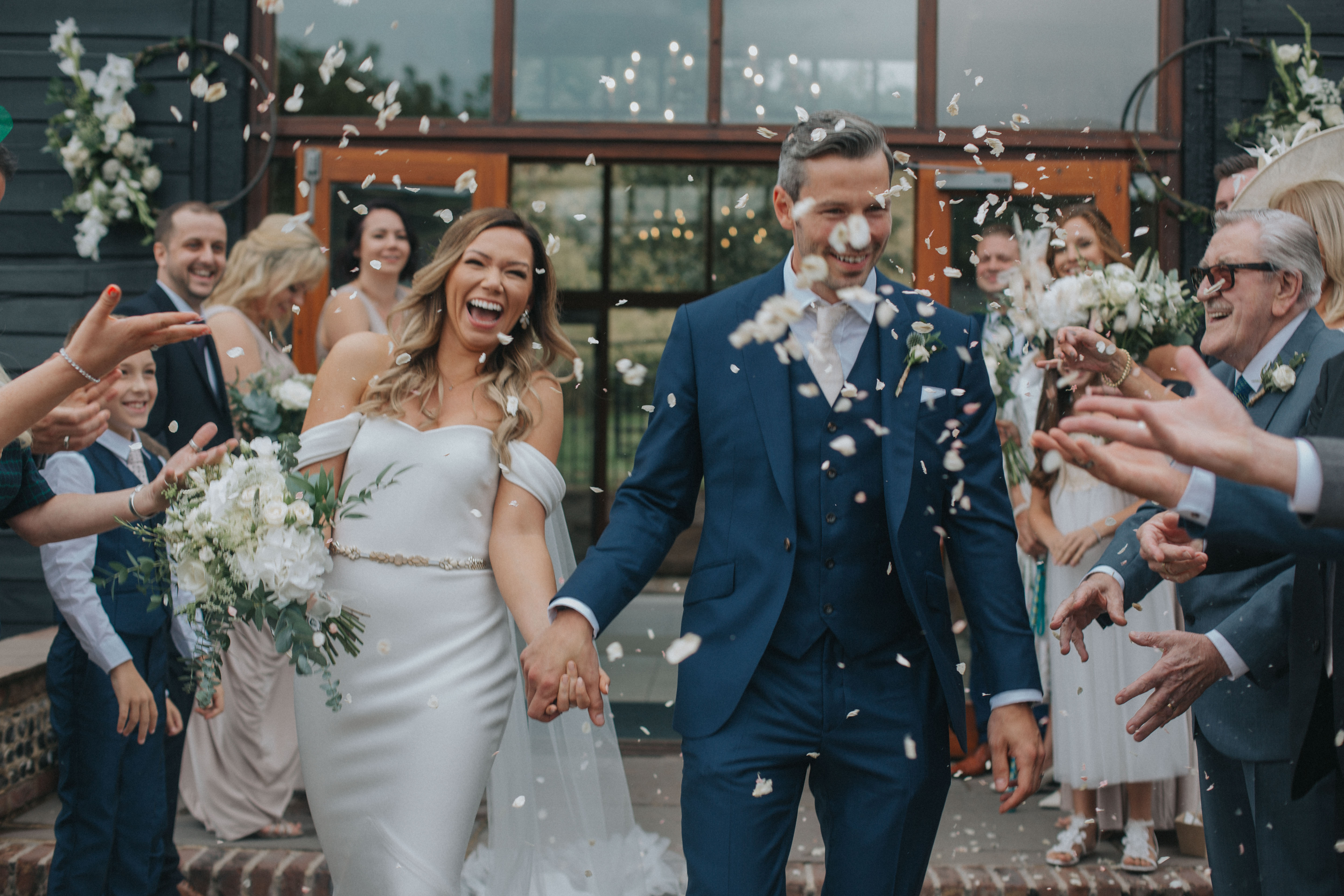 Confetti Upwaltham barns bride groom