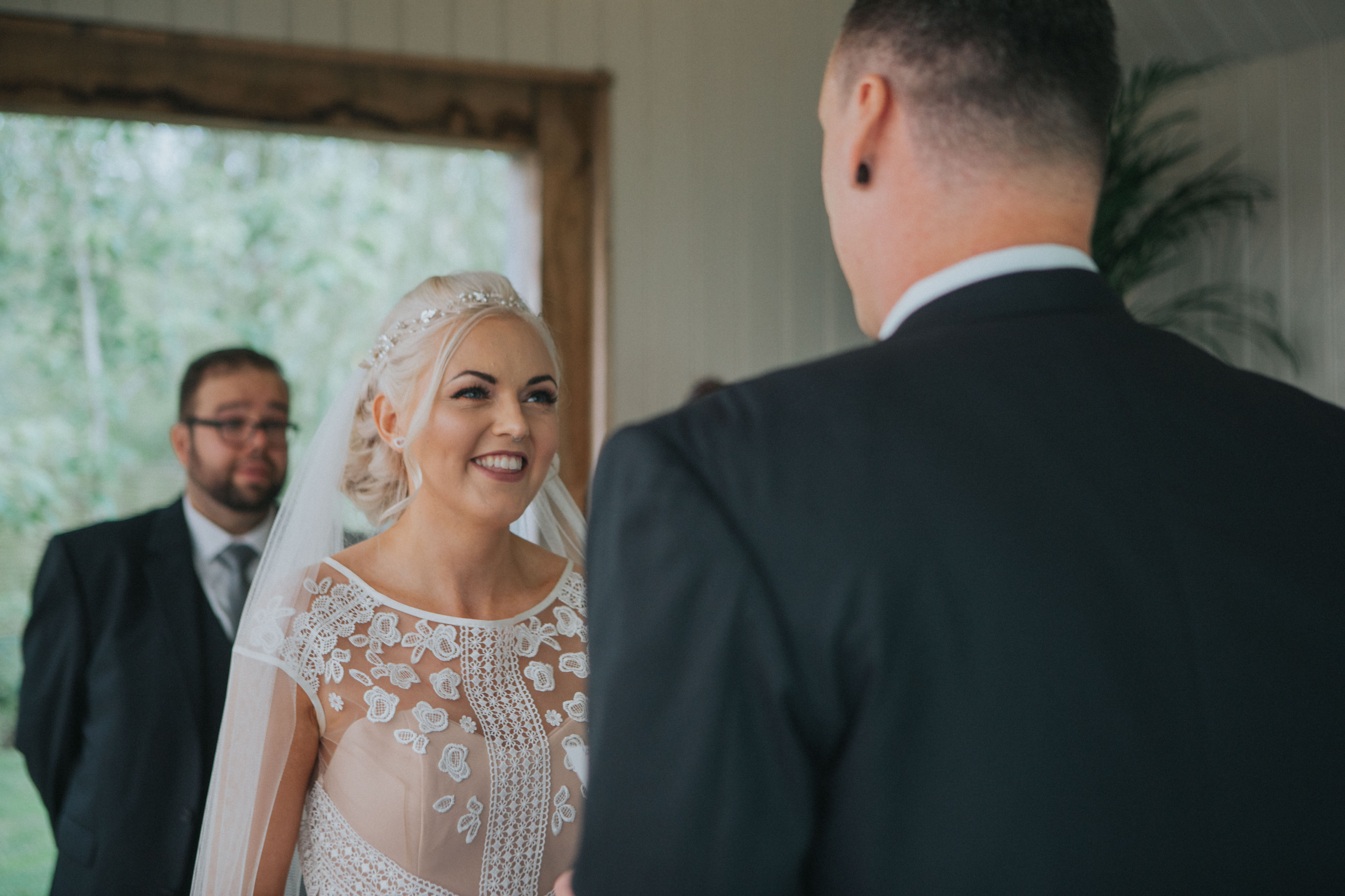 Houchins outdoor wedding ceremony under gazebo bride and groom