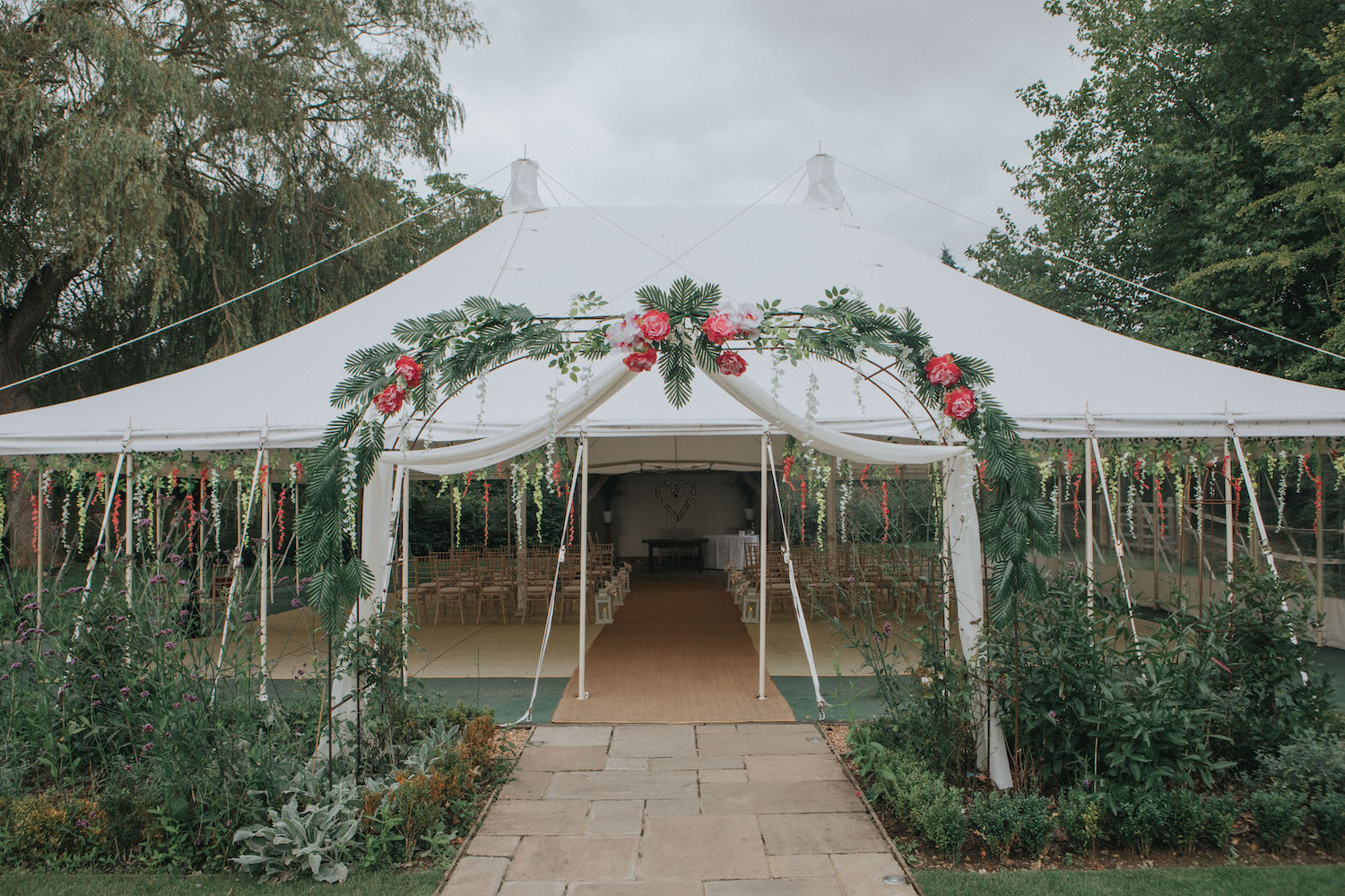 outdoor wedding ceremony marquee houchins tropical theme