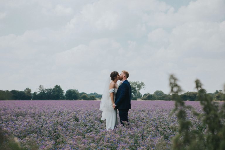 How to Look Natural in Wedding Photos & Have Fun While You’re Doing It