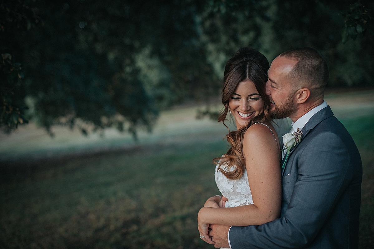 engaged braxted park wedding photography groom bride laughing