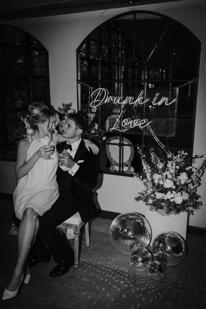 Bride and groom enjoying champagne toasts at Baddow Park Wedding