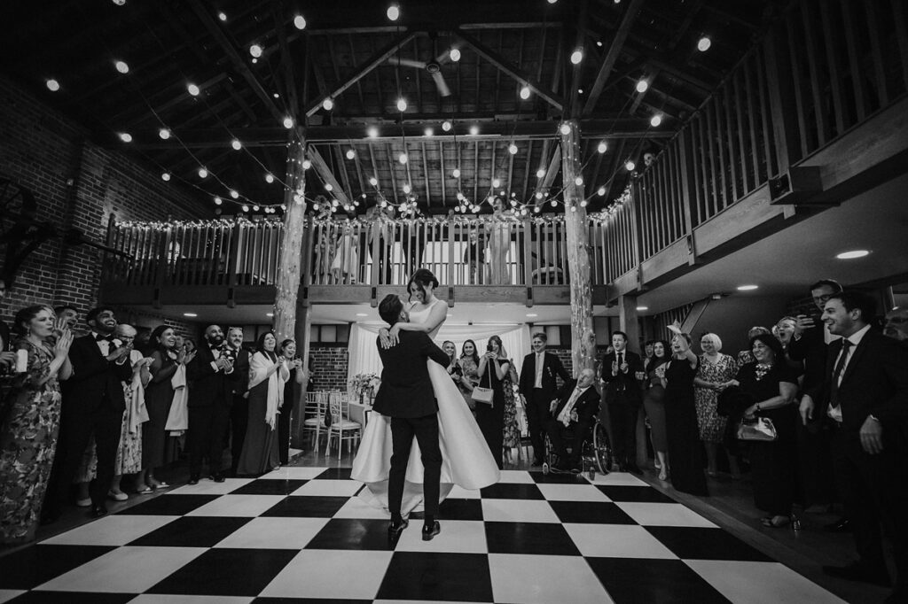 Bride and groom enjoying first dance at Gaynes Park